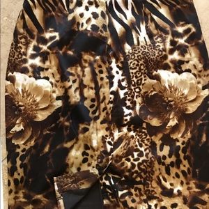 Cache black and brown animal print skirt size 4.